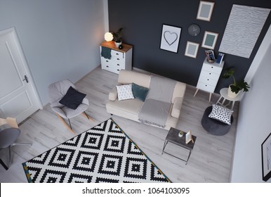 Living Room Interior With Comfortable Sofa And Rocking Chair, View Through CCTV Camera