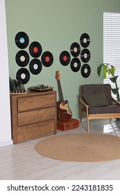Living room interior decorated with vinyl records
