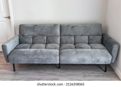 Living Room Interior With Front View Of Futon Couch Gray Sofa Sofabed With Microfiber Velvet Fabric In Modern Apartment Home House