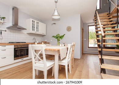 Living Room With Kitchen And Dining Area