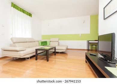 Living Room With Kitchen And Dining Area