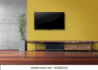 Living Room Led Tv On Yellow Wall With Wooden Table And Plant In Pot Modern Loft Style