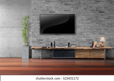 Living room led tv on brick wall with wooden table and plant in pot empty interior