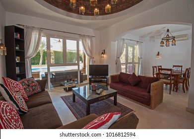 Living Room Lounge Area In Luxury Villa Show Home Showing Interior Design Decor Furnishing And Garden View