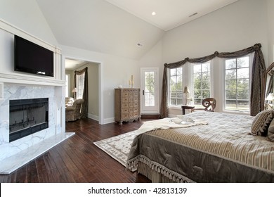 Living Room With Marble Fireplace