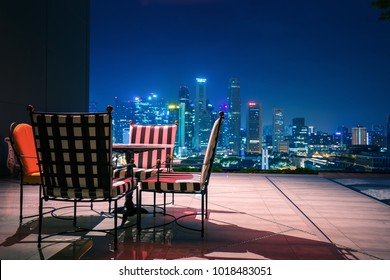 Living Room And Relax Corner On Roof Top Of Hotel In Singapore With Cityscape Background, Singapore