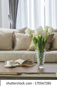 Living Room Sofa With Coffee Table Book And Flower