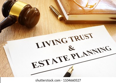 Living Trust And Estate Planning Form On A Desk.