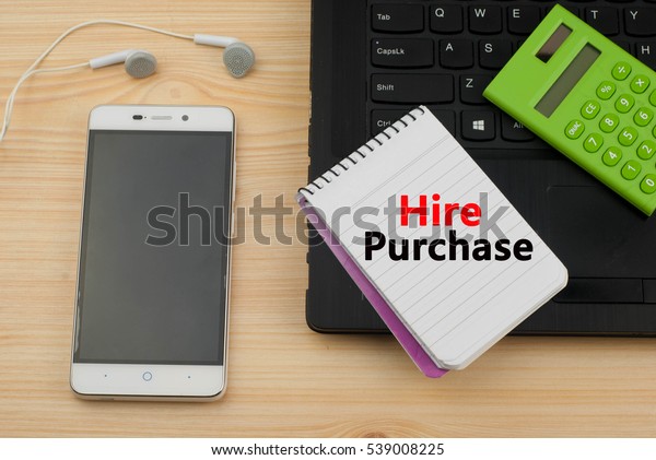 Living
trust text written on a notebook. Phone,laptop and calculator on
wooden background.Business or management
concept.