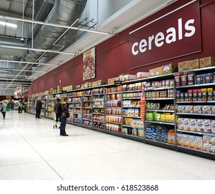 LIVINGSTON, SCOTLAND, UK - APRIL 7, 2017. Asda / Walmart Supermarket. People shopping in Asda supermarket, one of the biggest chains of supermarkets in United Kingdom.