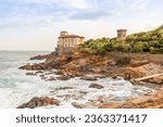 Livorno, Italy - 01 July 2023: Boccale Castle, seascape sunset. Rock and sea water.