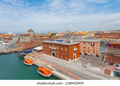 Livorno, Italy - June 4 2022: The Coast Guard Station And Skyline Of The Tuscan City Of Livorno Is Seen From A Cruise Ship In Port.