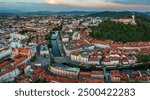 Ljubljana, Slovenia - Aerial panoramic view of Ljubljana on a summer afternoon with Franciscan Church of the Annunciation, Ljubljana Castle, Ljubljana Cathedral and skyline of the capital of Slovenia