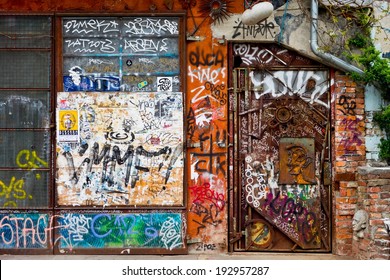 LJUBLJANA, SLOVENIA - APRIL 17: Graffitti On A Wall And Door In Squat Located In Metelkova Street In Ljubljana, Slovenia On April 17, 2014.