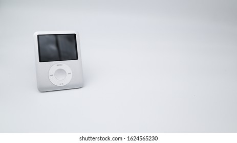 Ljubljana, Slovenia - January 24, 2020: IPod Nano 3rd Generation Device, Isolated On White Background. Apple MP3 Player With  Scroll Wheel.