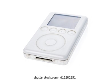 Ljubljana, Slovenia - March 15, 2017:  Old Apple IPod Classic 3rd Generation 15Gb 2003 Mp3 Player. Vintage Used And Worn White Apple IPod Mp3 Player Isolated On White Background.