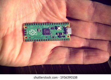 LJUBLJANA, SLOVENIA - MARCH 8 2021: Photo showing new $4 Raspberry Pi Pico microcontroller. Raspberry Pi Pico is a low-cost breakout board for RP2040 high performance microcontroller chip.