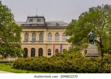 LJUBLJANA, SLOVENIA - MAY 14, 2019: National Museum Of Slovenia And Valvasor Statue In Ljubljana, Slovenia