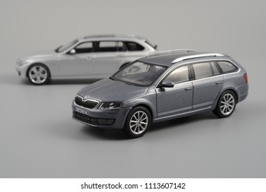 LJUBLJANA, SLOVENIA - MAY 15, 2018: Skoda Octavia A7 Estate Die-cast Scale Model In Front Of Modern  BMW 3-series Touring F31 Car Scale Model 1:43 Size. Cars Comparison.