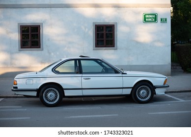 LJUBLJANA, SLOVENIA - MAY 27, 2020: BMW 635CSi E24 Classic German Grand Tourism Luxury Coupe 1980s Fast Car On The Street. Side View.