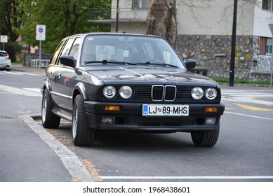 LJUBLJANA, SLOVENIA - MAY 3, 2021: BMW E30 Touring Old Classic German Estate Station Wagon 1980s Car On The City Street