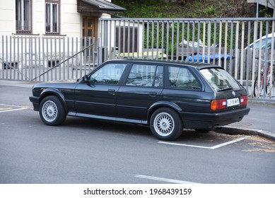 LJUBLJANA, SLOVENIA - MAY 3, 2021: BMW E30 Touring Old Classic German Estate Station Wagon 1980s Car On The City Street