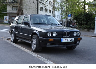 LJUBLJANA, SLOVENIA - MAY 3, 2021: BMW E30 Touring Old Classic German Estate Station Wagon 1980s Car On The City Street