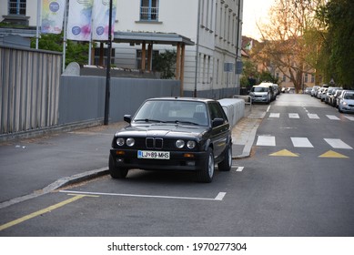 LJUBLJANA, SLOVENIA - MAY 3, 2021: BMW E30 Touring Old Classic German Estate Station Wagon 1980s Car On The City Street