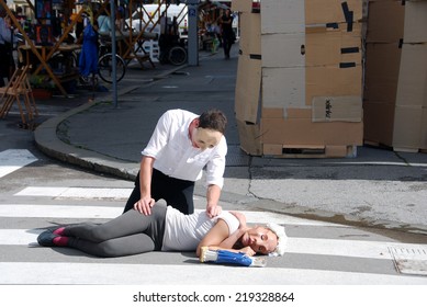 LJUBLJANA, SLOVENIA - SEP. 22, 2014: Juliet's Fake Death In Play Romeo And Juliet (by Street Theater Ana Monro & Sugla) At Street Festival Our Streets, Our Decision On European Mobility Week 2014. 