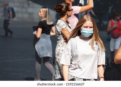 LJUBLJANA, SLOVENIA - SEPTEMBER 15, 2021: Selective Blur On Young Woman, Alone, Wearing A Facemask, Waking In Street Of Ljubljana During Coronavirus Covid 19  Crisis.






