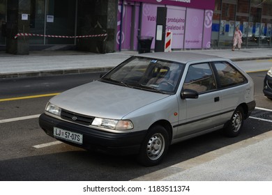 LJUBLJANA, SLOVENIA - SEPTEMBER 19, 2018: Hyundai Pony Excel 1999s Made In Korea Compact Car Parked On The Street.