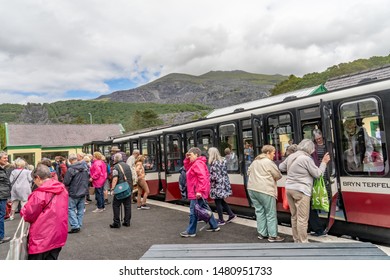 Llanberis, Wales, UK – June 30 2019. Passengers Getting Off The Diesel Train Service At Llanberis Train Station After A Trip To The Summit Of Mount Snowdon On The Mount Snowdon Railway Line