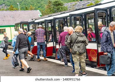 Llanberis, Wales, UK – June 30 2019. Passengers Getting Off The Diesel Train Service At Llanberis Train Station After A Trip To The Summit Of Mount Snowdon On The Mount Snowdon Railway Line