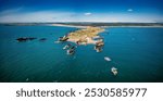 Llanddwyn Island with Twr Mawr Lighthouse panoramic aerial view. Anglesey, North Wales, UK.