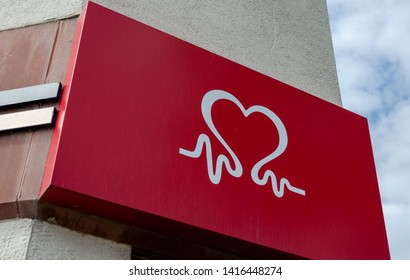 Llandudno, UK - May 6, 2019: Sign Above The Llandudno Branch Of The British Heart Foundation Home Store. The Charity Shop Specialises In Used Furniture, Household Appliances And Electrical Goods.