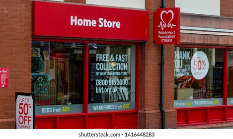 Llandudno, UK - May 6, 2019: The Llandudno Branch Of The British Heart Foundation Home Store. The Charity Shop Specialises In Used Furniture, Household Appliances And Electrical Goods.