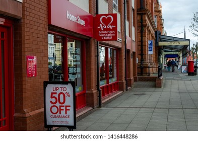 Llandudno, UK - May 6, 2019: The Llandudno Branch Of The British Heart Foundation Home Store. The Charity Shop Specialises In Used Furniture, Household Appliances And Electrical Goods.