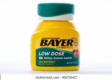 LLANO, TX-AUG 16, 2015: Bottle Of Bayer Low Dose Aspirin Against White Background.  Recommended By Doctors To Reduce Chance Of Heart Attack.