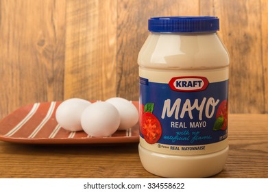 LLANO, TX-NOV 2, 2015:  Kraft Mayo And Eggs Against Rustic Wooden Wall To Emphasize Its 