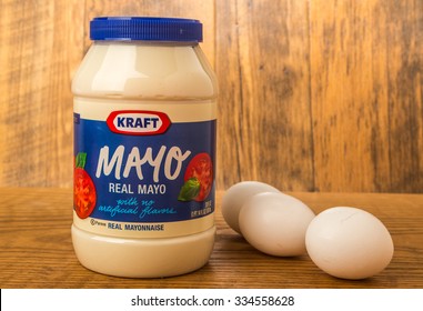 LLANO, TX-NOV 2, 2015:  Kraft Mayo And Eggs Against Rustic Wooden Wall To Emphasize Its 