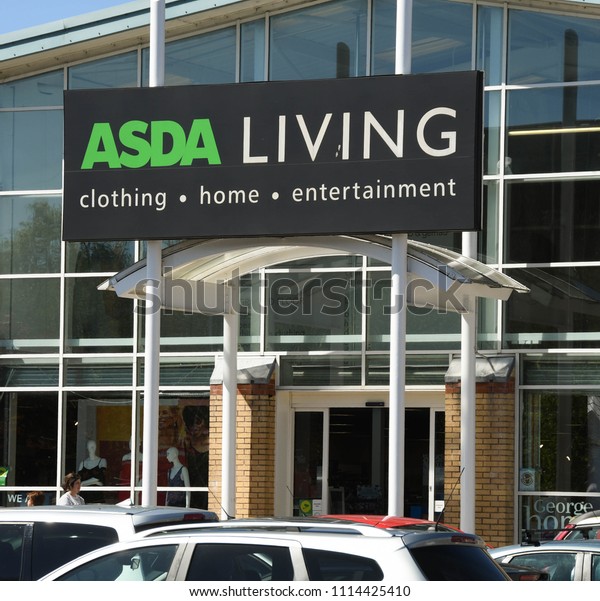 LLANTRISANT, WALES - MAY 2018: Close up view of a\
large sign above the entrance to an ASDA Living store on an out of\
town retail park