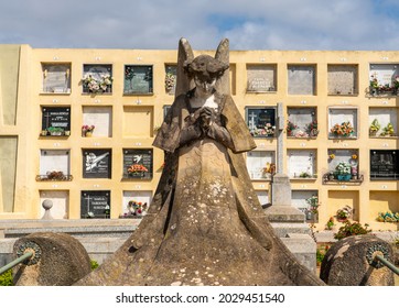 Lloret De Mar, Catalonia, Spain - 08.20.2021: Sad Angel Statue Pray In Modernist Cemetery