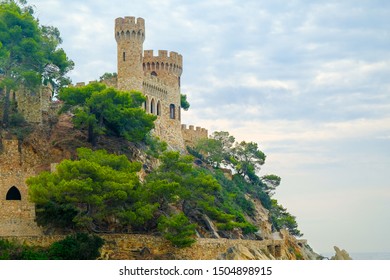 Lloret De Mar, Costa Bravo. Castle On The Cliff In Cloudy Day. Catalonia, Spain.