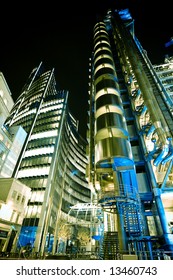 Lloys building at night, London city.