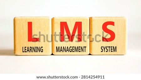 LMS learning management system symbol. Concept words LMS learning management system on beautiful wooden blocks. Beautiful white background. Business LMS learning management system concept. Copy space