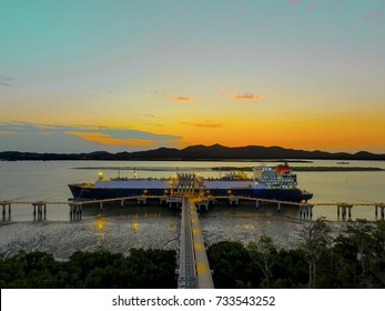 LNG Ship Moored At Sunset