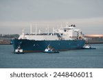 LNG Tanker Mooring In The International Trade Port. Gas Transpor