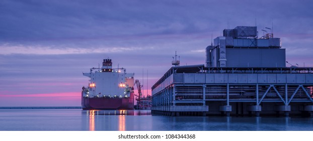 LNG TANKER - Sunrise Over The Sea Gas Terminal
