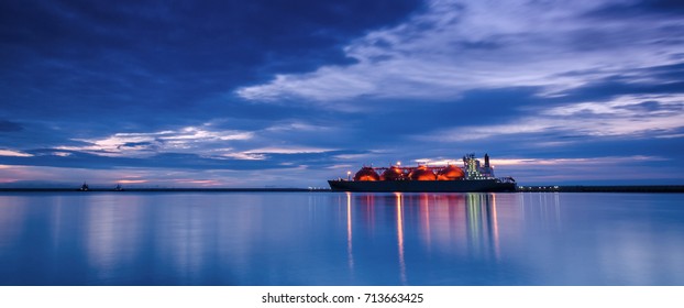 LNG TANKER - Sunrise over the sea gas terminal