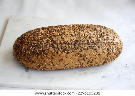 Load of Bread, whole grain bread ,  wheat bread on white background, Meal , Diet, Nutritious, Healthy option